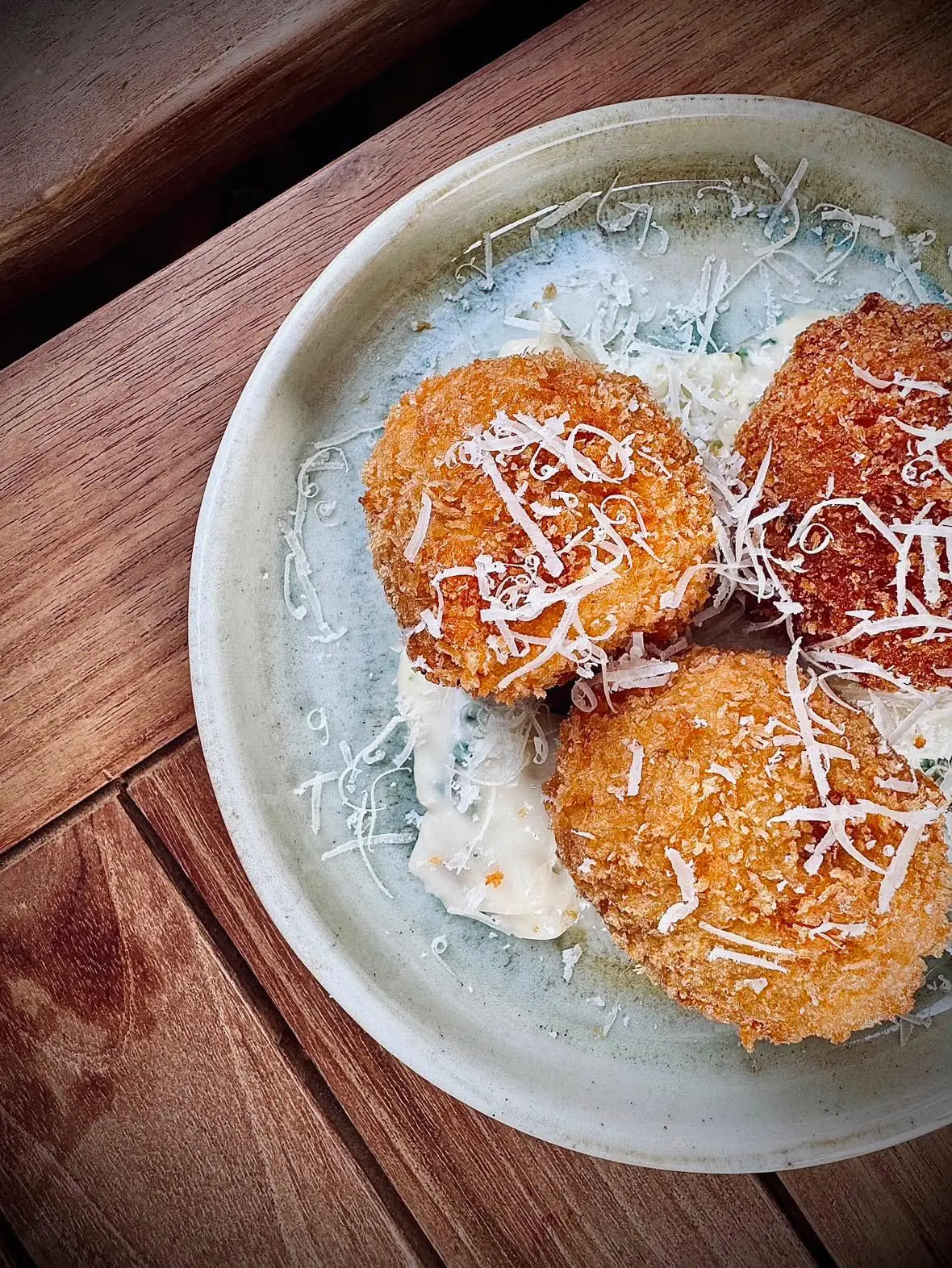 Wild mushroom arancini with parmesan and truffle cream