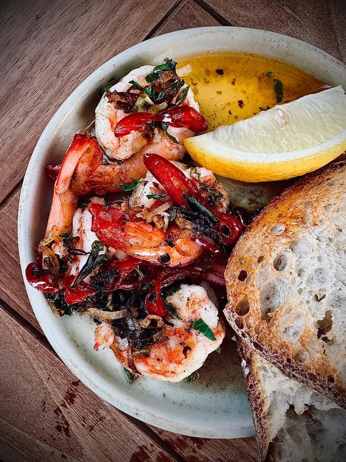 Chilli and garlic king prawns with sourdough and lemon