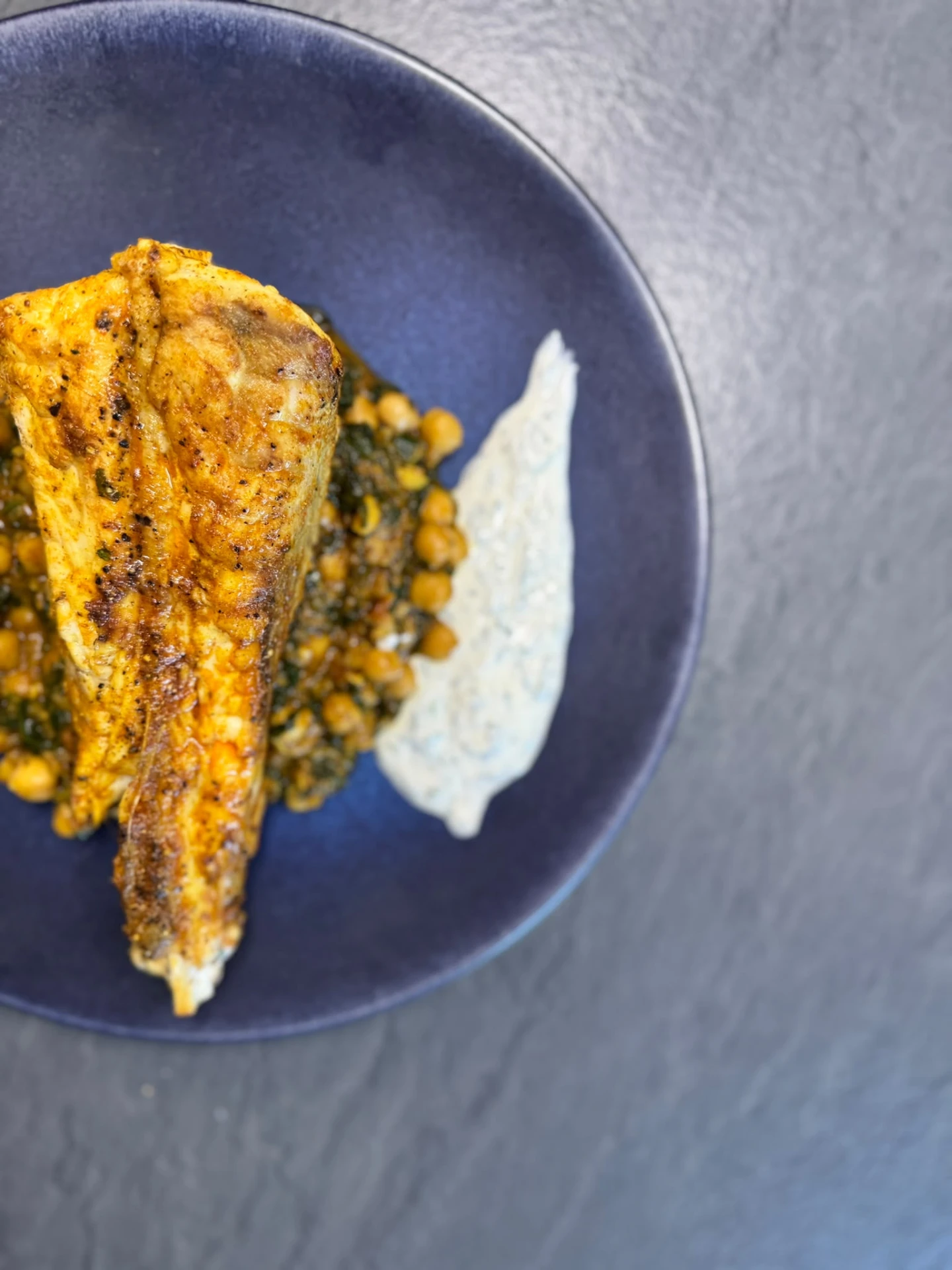 Pan-roasted fish with chickpeas and herb yoghurt