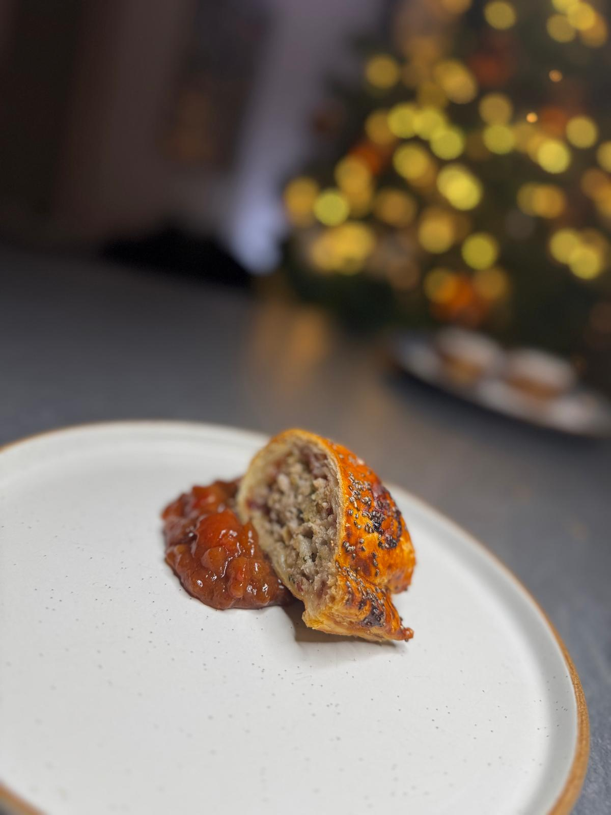 Handmade sausage roll with spiced tomato chutney