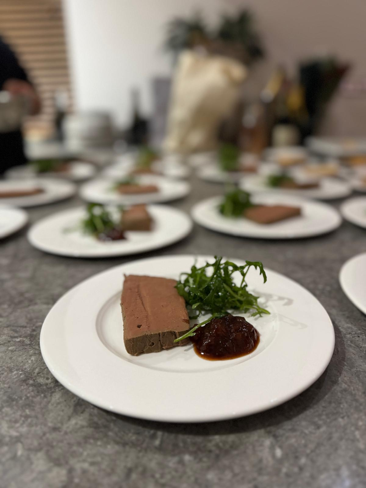 Smooth chicken liver pâté with chutney and dressed leaves